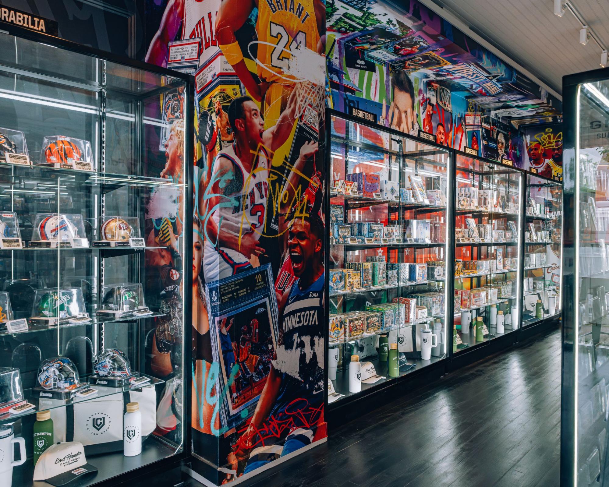 interior of a Card Vault location display cases lining the wall